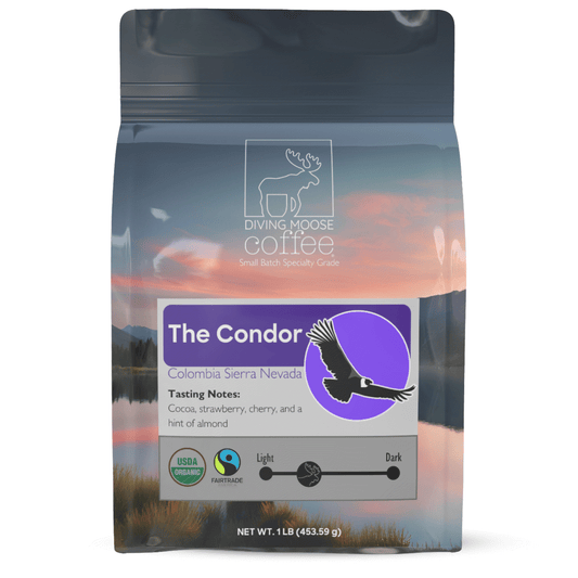 The Condor Colombia Sierra Nevada organic medium-light roast coffee bag with tasting notes of cocoa, strawberry, cherry, and almond, USDA organic and fair trade certified
