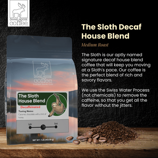 The Sloth Decaf House Medium-Light Roast Blend coffee bag with coffee beans and grounds on wooden surface