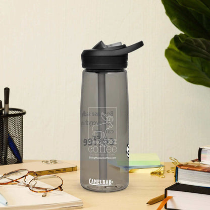 CamelBak Eddy+ water bottle made from 50% recycled plastic with spill-proof lid and bite valve on desk