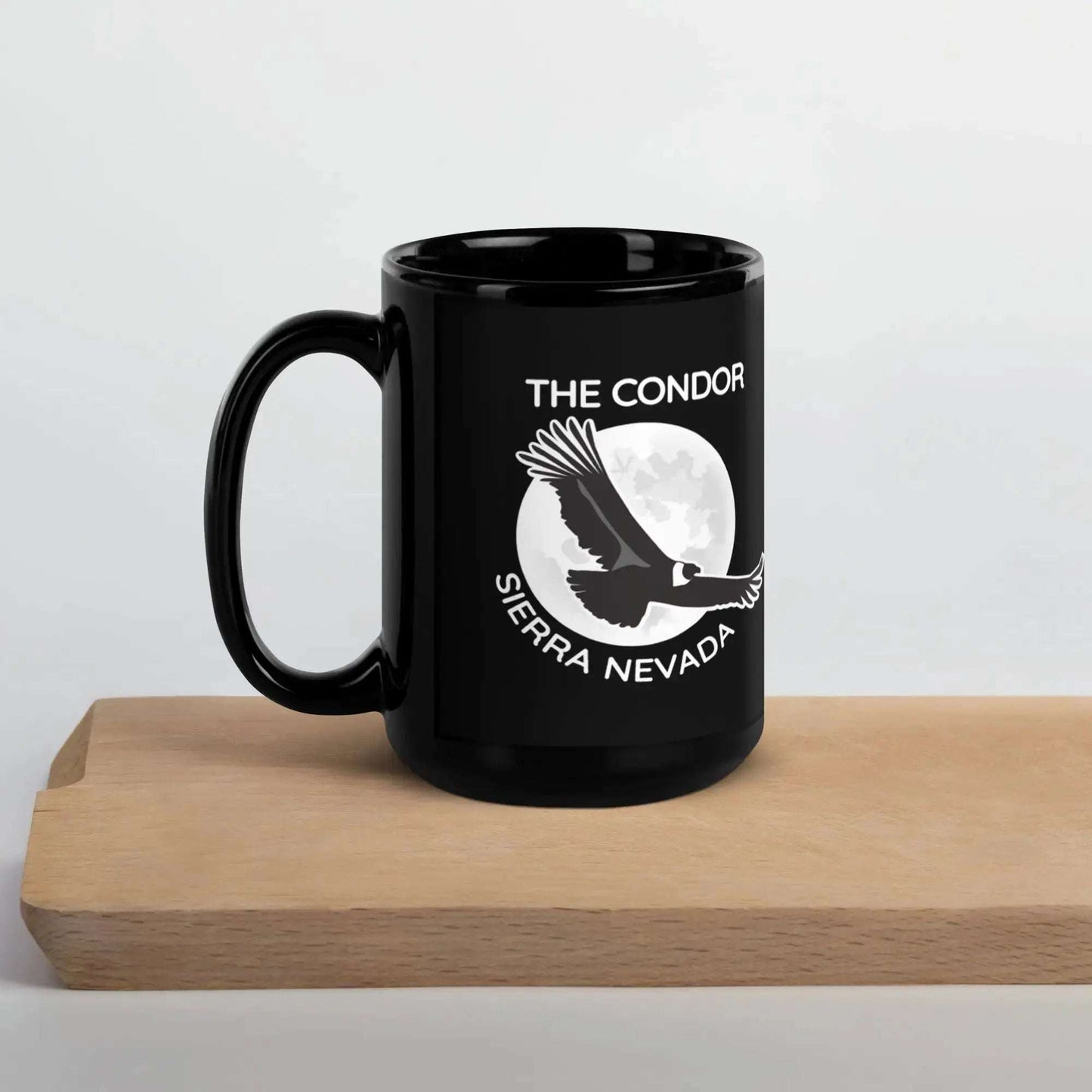 Black glossy 15 oz ceramic DMC Condor Glossy Mug with Condor and Sierra Nevada design, dishwasher and microwave safe