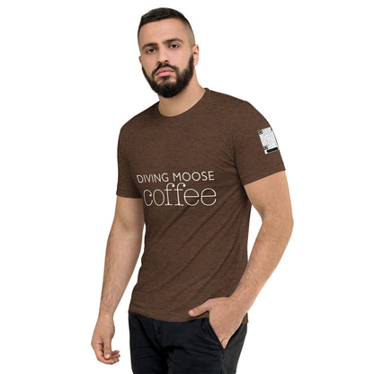 Man wearing brown DMC Word Logo tri-blend t-shirt with QR code on sleeve