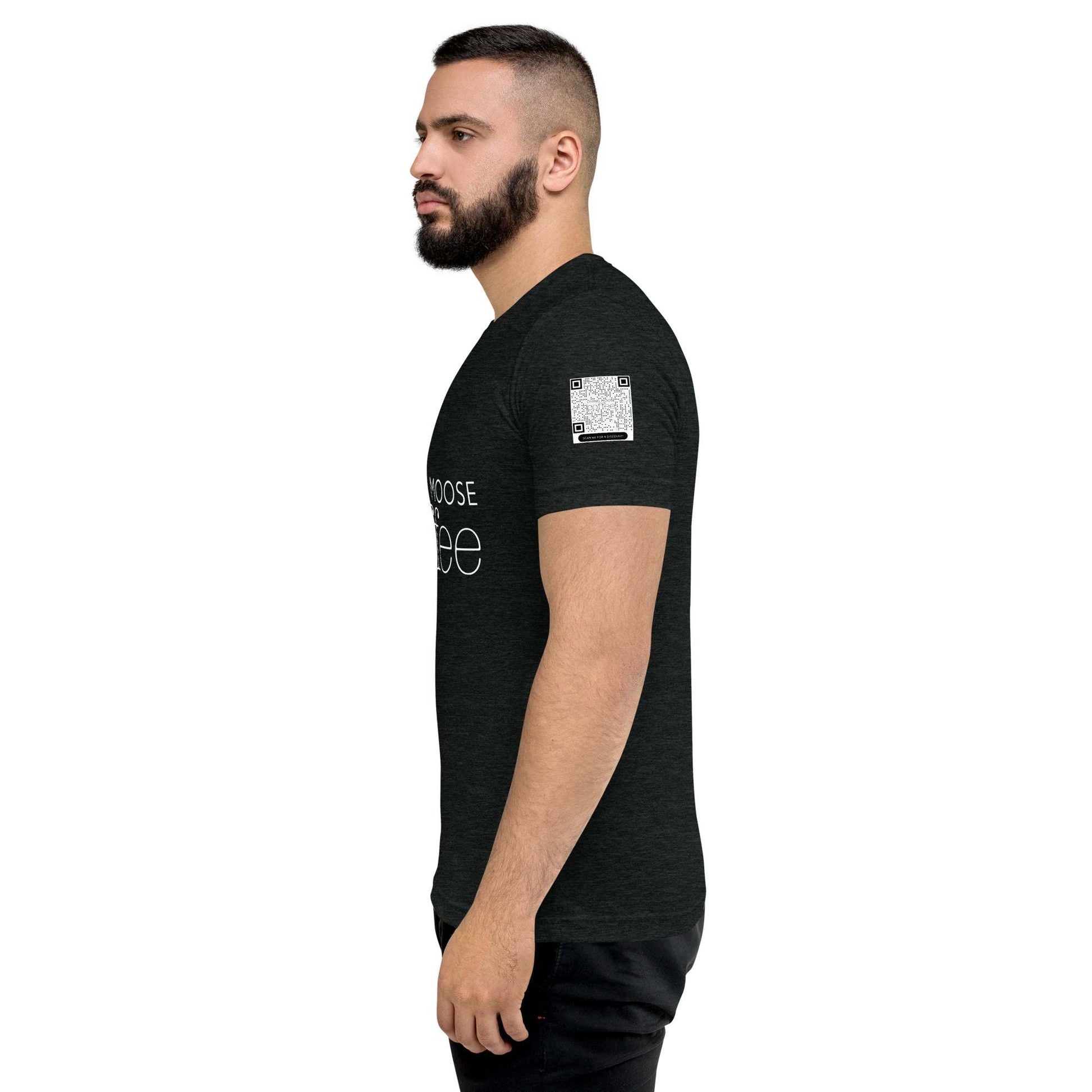 Side view of man wearing black DMC Word Logo tri-blend t-shirt with QR code on sleeve