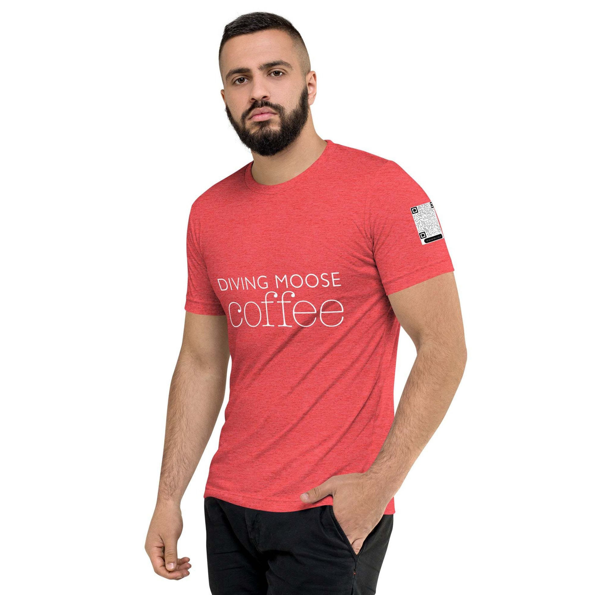 Man wearing red DMC Word Logo tri-blend t-shirt with QR code on sleeve