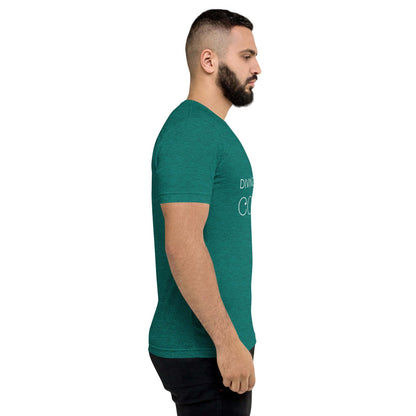 Side view of man wearing green DMC Word Logo tri-blend short sleeve t-shirt with QR code on sleeve