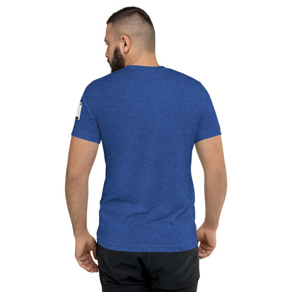 Man wearing blue DMC Word Logo tri-blend t-shirt with QR code on sleeve, back view